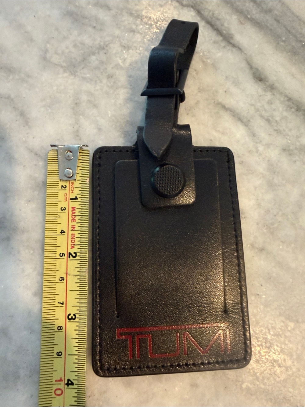 TUMI Genuine Leather Luggage Tag in Black with Red Logo